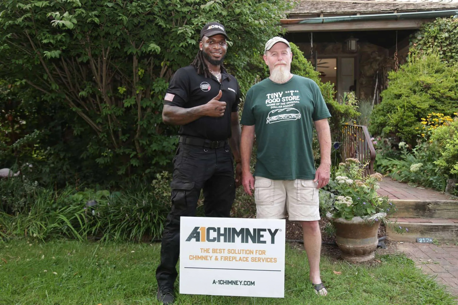 A1 Chimney certified technician with a satisfied customer